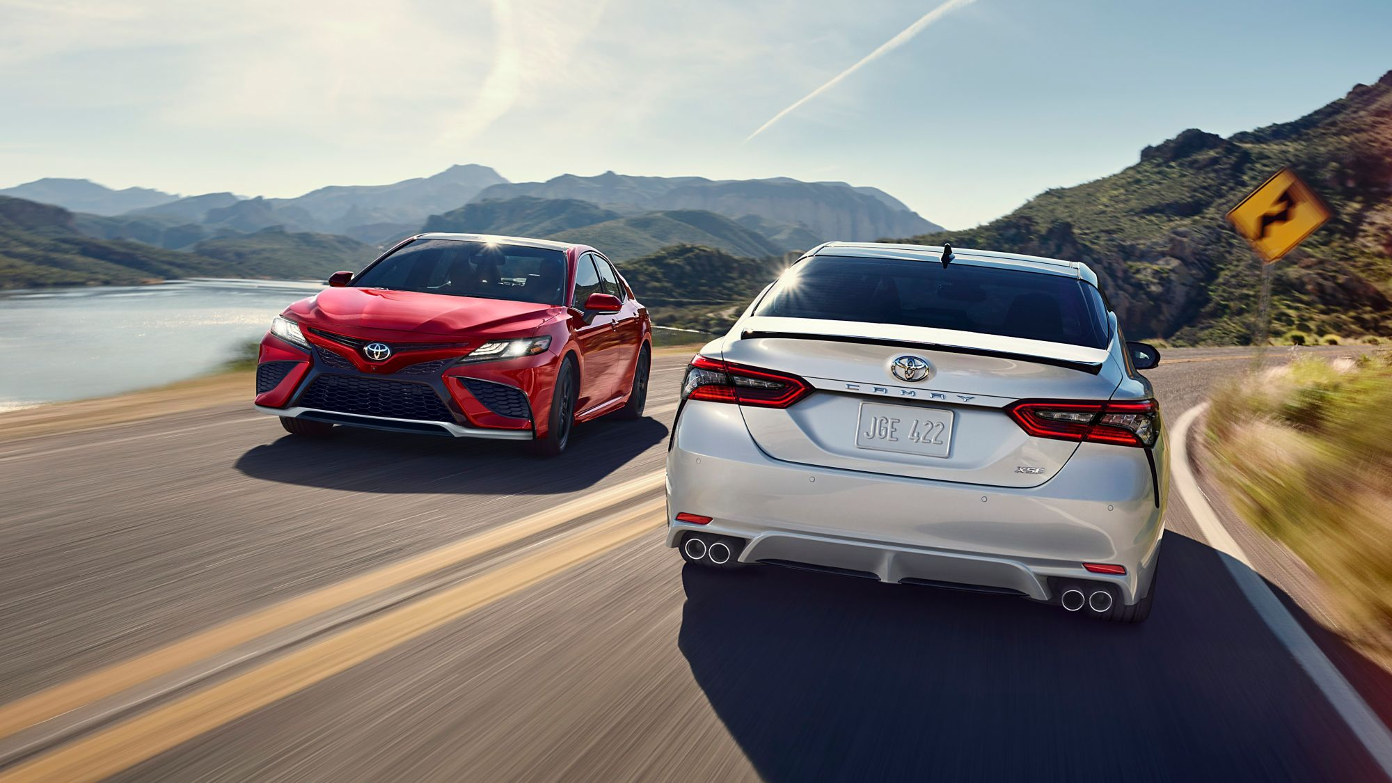 2024 toyota camry models driving by each other